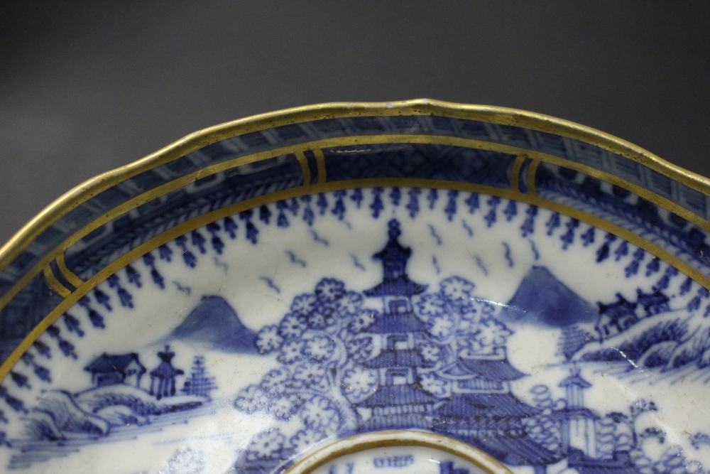 A 19TH CENTURY TWO HANDLED 'CHOCOLATE' CUP & SAUCER, with deep saucer, having detailed imagery of - Image 11 of 13