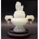 A CARVED JADE TWO HANDLED CENSER WITH LID, the lid having an open mouthed guardian lion, the handles