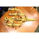 A BRASS WALL LIGHT WITH 3 LIGHT BRANCHES, decorated with a large flowing ribbon bow and reeded