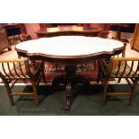 A FRENCH MARBLE TOPPED CENTRE TABLE, with a swivel top, 2 frieze drawers beneath, raised on a turned