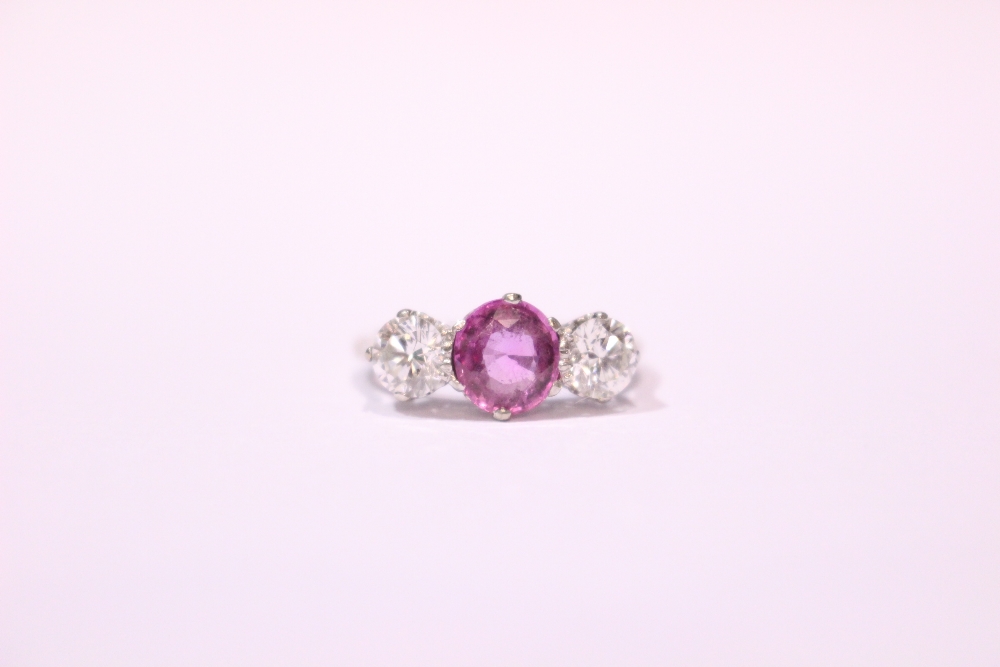 AN 18CT WHITE GOLD 3 STONE DIAMOND & SAPPHIRE RING, with a central pink sapphire flanked by a - Image 2 of 2