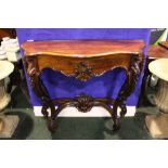 A VERY FINE ROSEWOOD CARVED CONSOLE TABLE, with scalloped shaped top, which lifts to reveal lined