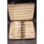 A CASED SET OF SILVER PLATED FISH KNIVES AND FORKS