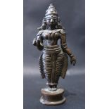 A 19TH CENTURY, MINATURE BRONZE SCULPTURE OF A DEITY, possibly Indian, 12cm high