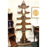 A 'TREE OF LIFE' COAT RACK, oak, with mirror to the centre, 10 branches, each with turned coat hook,