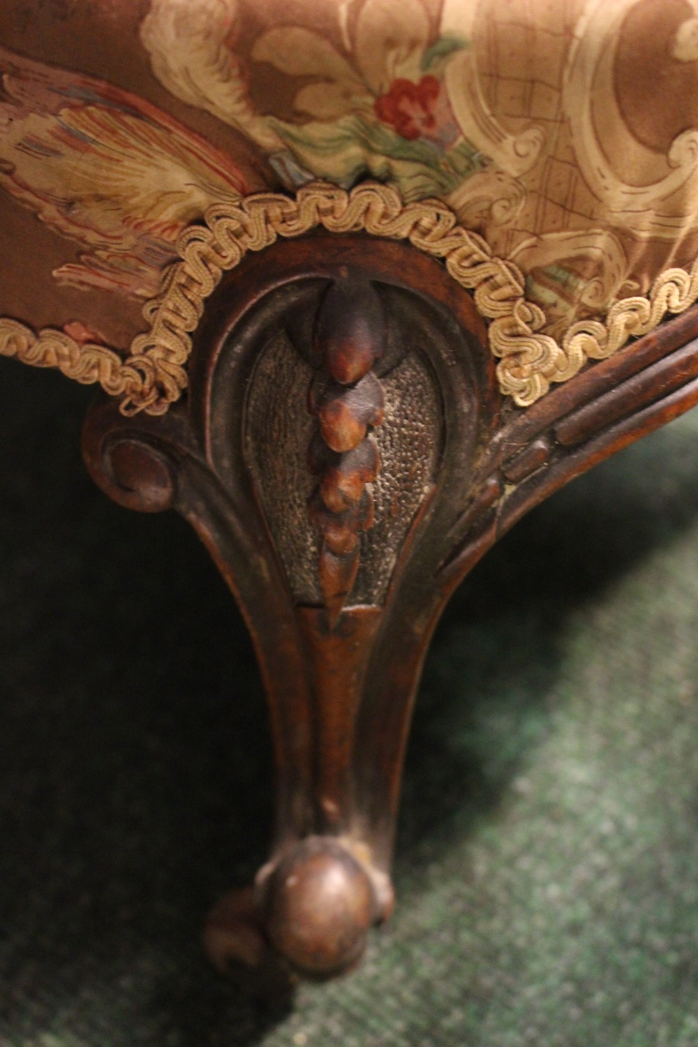 A LOW RISE BEDROOM / NURSING CHAIR, with carved rose detail to the frame, raised on short cabriole - Image 3 of 3