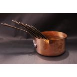 A SET OF 5 COPPER SAUCEPANS