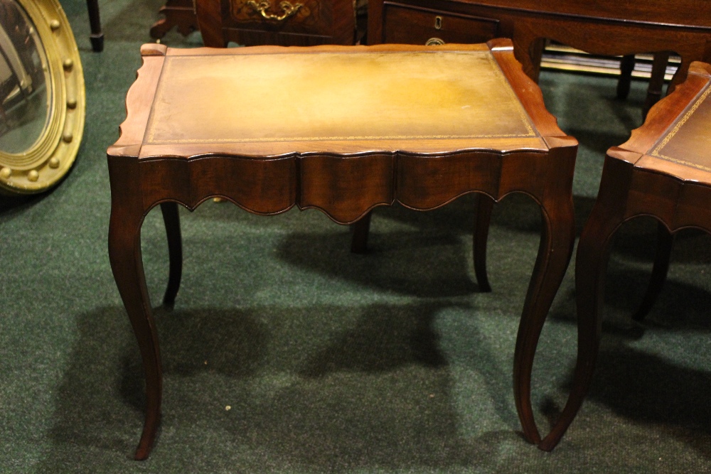 A PAIR OF SERPENTINE SHAPED LEATHER TOPPED TABLES, raised on cabriole shaped legs 26" x 19" x 22" - Image 2 of 4