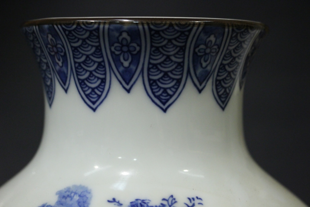 A JAPANESE BALUSTER SHAPED VASE, with blue & white colouring, having a large image of a wooded - Image 4 of 5
