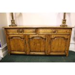 A 20TH CENTURY WOODEN SIDEBOARD, with 2 drawers over 3 door cabinet beneath, 75" x 18" x 36" approx
