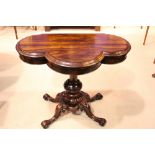 A VERY FINE 19TH CENTURY ROSEWOOD ‘CLOVER’ SHAPED FOLD OVER CARD TABLE, raised on a wonderfully
