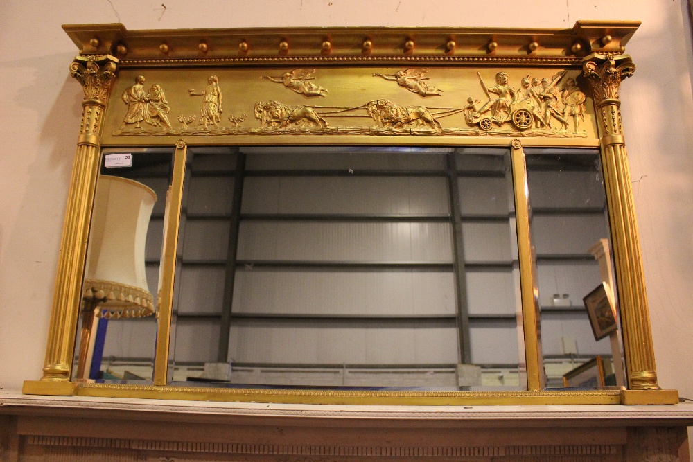 A FINE REGENCY TRIPLE PLATE OVER MANTLE MIRROR, with Corinthian columns to each side of the bevelled