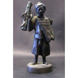 A 19TH CENTURY MINATURE BRONZE SCULPTURE, Possibly Japanese, of a boy carrying bamboo, 13cm high