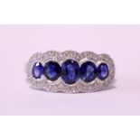 AN 18CT WHITE GOLD 5 STONE SAPPHIRE & DIAMOND ART DECOY STYLE RING