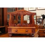 A VERY FINE CANTEBURY STAND, with carved dividers in the form of trees, with a single base drawer,