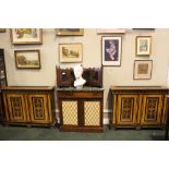 A PAIR OF VERY FINE SATINWOOD RADIATOR CABINS, with ebonised framed detail, the front with a pair of