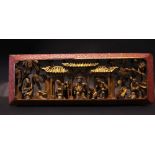 A GILTWOOD CARVED ORIENTAL SCENE, depicting figures, animals & florals 14.79" x 5.25" approx