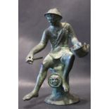 EARLY 19TH CENTURY MINATURE BRONZE SCULPTURE OF A MAN SITTING, 11cm high approx