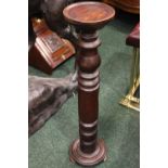 A JARDINERE STAND, with turned column base, and circular top, 31" x 8" approx