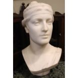 A CARVED ALABASTAR BUST OF A LADY, with classical head dress, 18.5" x 11" x 9" approx