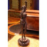 A BRONZE STATUE OF A LADY, on a marble base, 17" tall approx