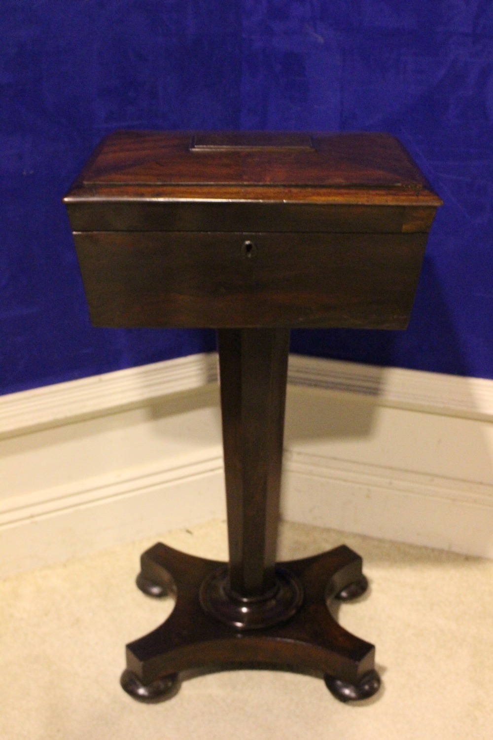 A ROSEWOOD TEA CADDY, with hinged lid, compartments within, and a single antique glass, raised on an - Image 2 of 6