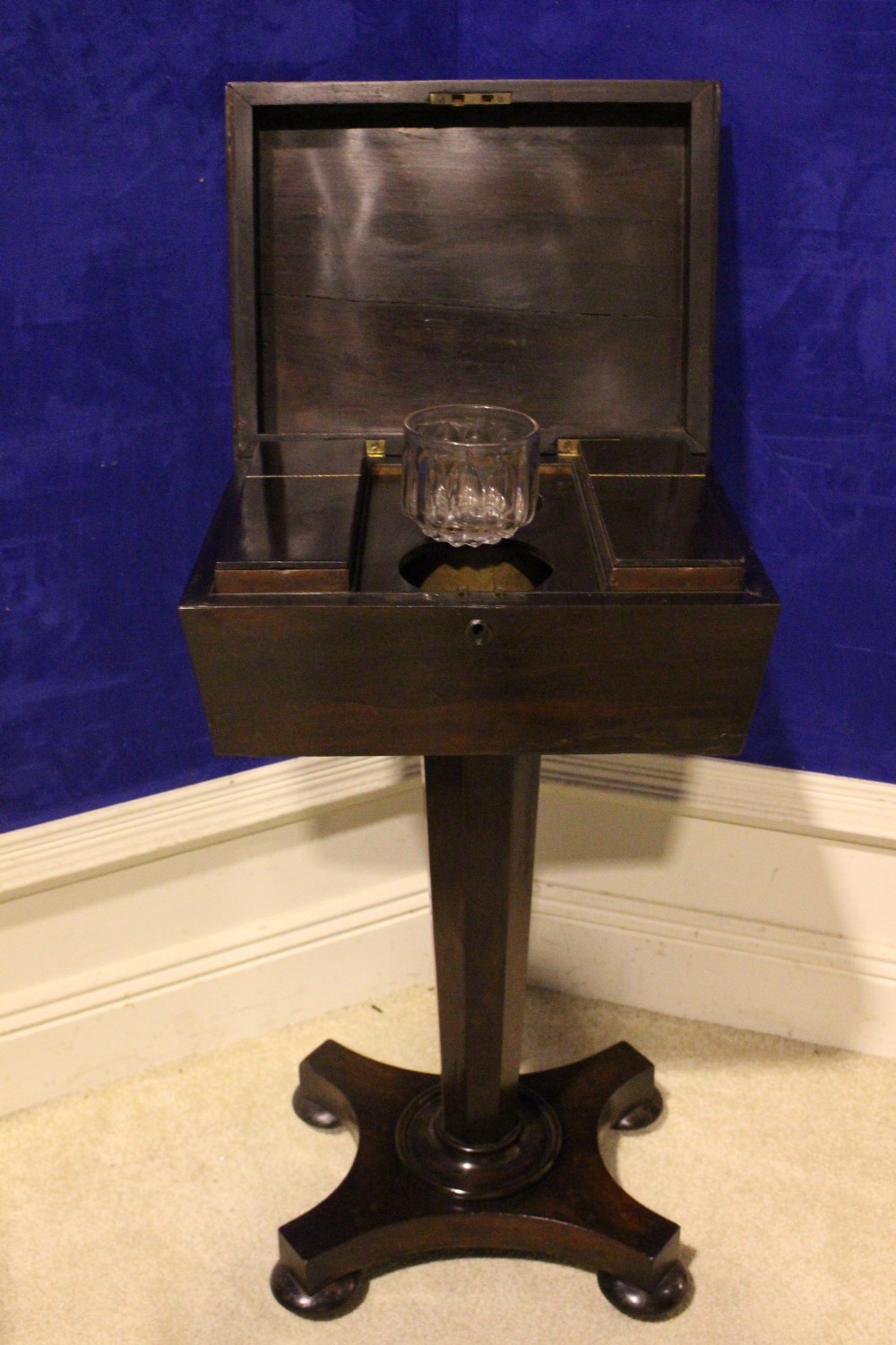 A ROSEWOOD TEA CADDY, with hinged lid, compartments within, and a single antique glass, raised on an - Image 5 of 6