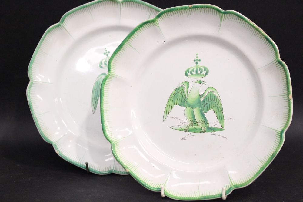 A PAIR OF “LES ISLETTES FAIENCE” STYLE PLATES, decorated with a central image of a crowned eagle