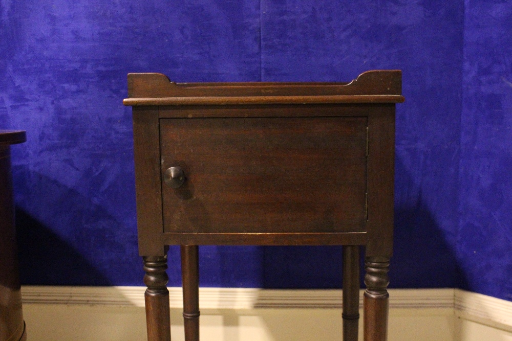 A GEORGIAN MAHOGANY CABINET, with a single door, raised on turned legs, with a raised gallery - Image 2 of 3