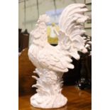 A LARGE PORCELAIN MODEL OF A COCERAL, ornament, 23" tall, 13 wide x 6" deep approx