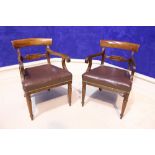 A PAIR OF REGENCY SCROLL ARMCHAIRS, with broad crest rail, over a carved back support, reeded frame,