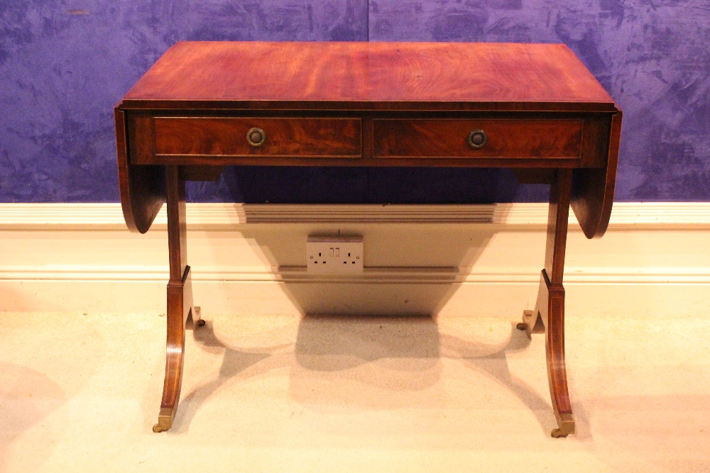 A MAHOGANY REGENCY STYLE SOFA TABLE, with drop leaves, 2 frieze drawers and 2 faux drawers, raised - Image 2 of 3