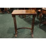 A NEST OF TWO ROSEWOOD TABLES, raised on four pairs of ring turned tapered legs united by bentwood