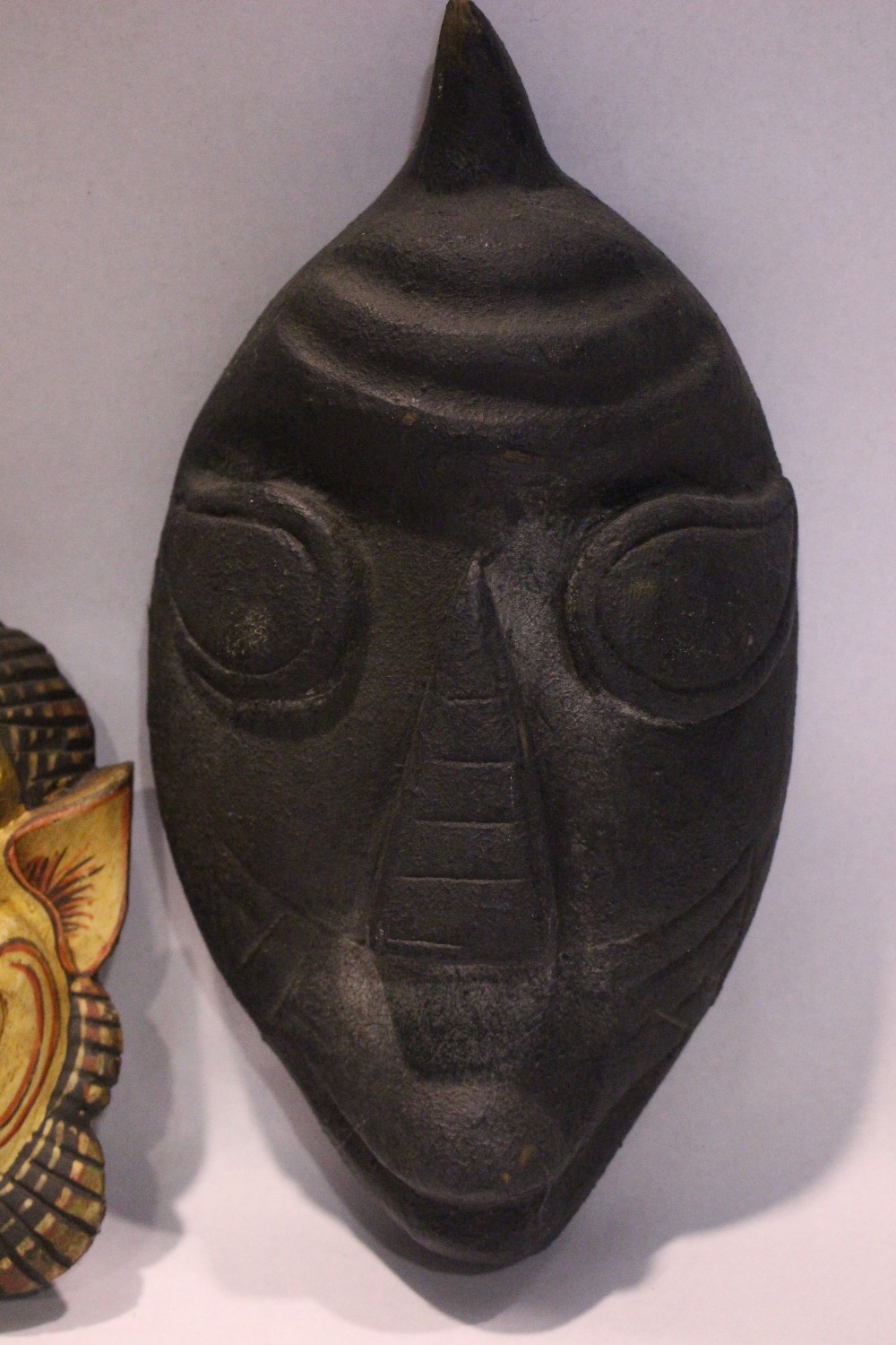TWO CARVED 'TRIBAL' MASKS, (i) An open mouthed lion, colourful mask, 8" x 7" x 3.5" approx (ii) An - Image 3 of 3