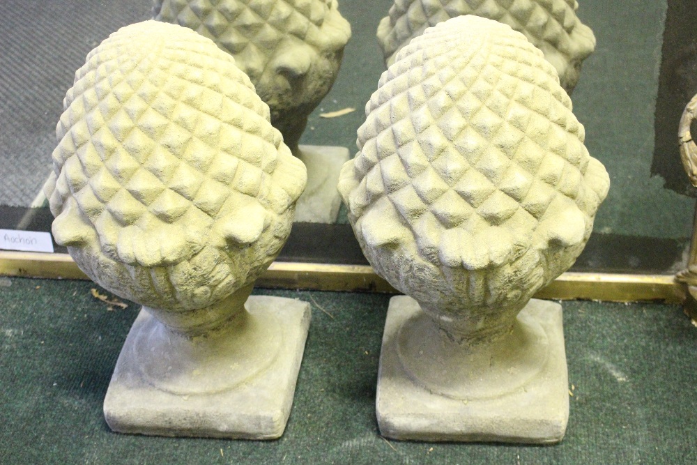 A PAIR OF PIER TOPPERS IN THE FORM OF PINEAPPLES, 24" tall approx