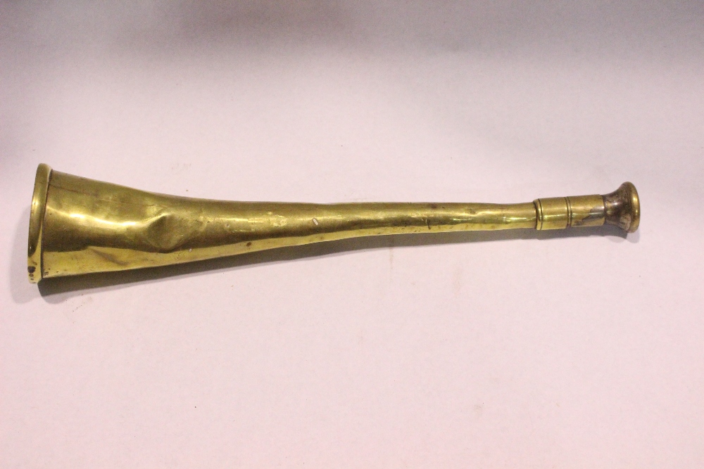 A BRASS HUNTING HORN, 10.5" long approx