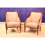 A PAIR OF MAHOGANY BRASS INLAID ARM CHAIRS