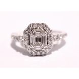 A PLATINUM 'HALO' DIAMOND RING, 1ct diamonds