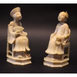A PAIR OF CARVED IMPERIAL FIGURES, a man holding a fan, a lady holding beads, old breaks repaired,