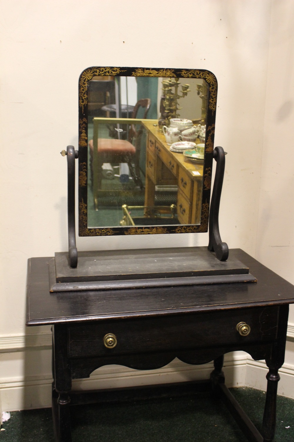A LARGE TABLETOP SWING MIRROR / DRESSING MIRROR, in the Chinoiserie style, with gilt imagery of