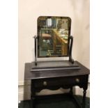 A LARGE TABLETOP SWING MIRROR / DRESSING MIRROR, in the Chinoiserie style, with gilt imagery of