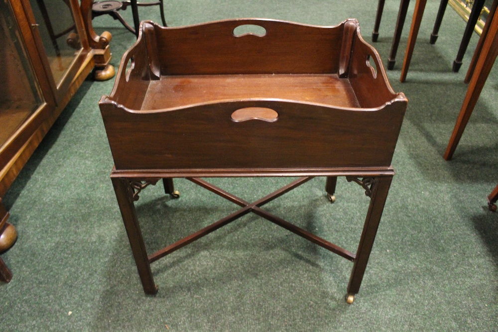 A 19TH CENTURY DECANTER / BUTLERS TABLE, with raised pierced sides, on square leg united by a 'x'