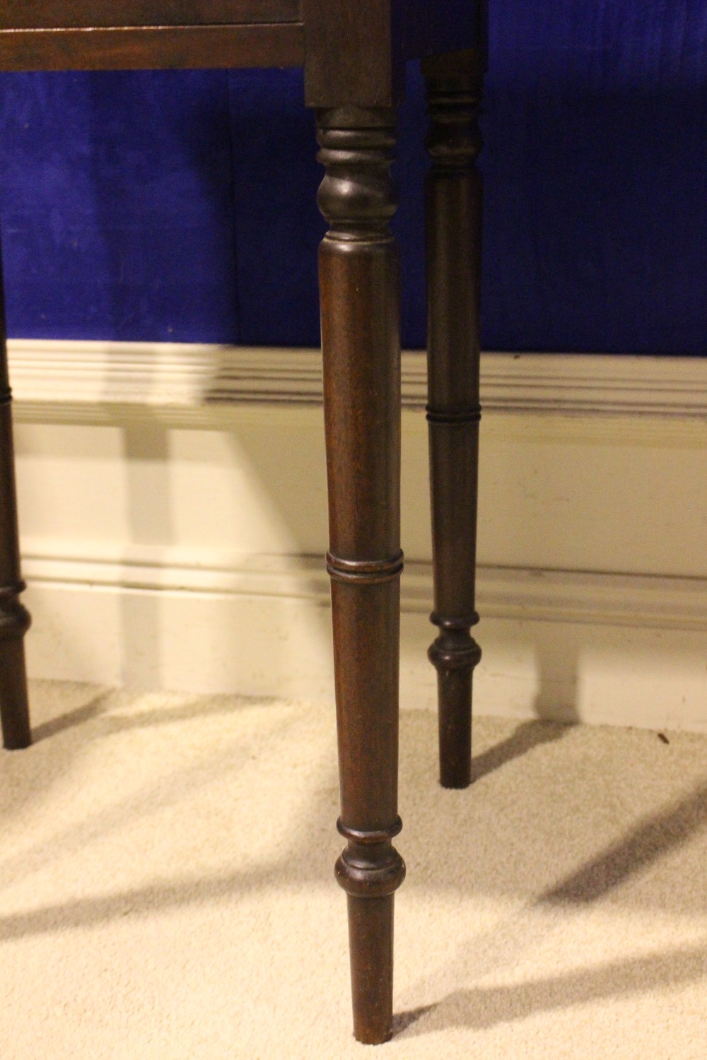 A GEORGIAN MAHOGANY CABINET, with a single door, raised on turned legs, with a raised gallery - Image 3 of 3