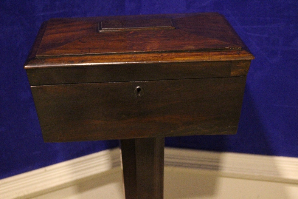 A ROSEWOOD TEA CADDY, with hinged lid, compartments within, and a single antique glass, raised on an - Image 3 of 6