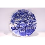 A CHINESE BLUE & WHITE PORCELAIN PLATE, with images of a pheasant amongst flowering trees in a