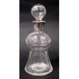 A SILVER COLLARED GLASS DECANTER, with stopper, London, standard sterling silver date 1905/06,