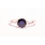 AN 18CT WHITE GOLD SAPPHIRE & DIAMOND RING, with tapered baguette cut diamond to the shoulders