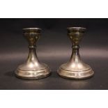 A PAIR OF SILVER CANDLE STICKS, Birmingham, date letter 'E' for possibly 1929, maker's mark for Adie