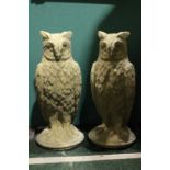 A PAIR OF GARDEN ORNAMENTS IN THE FORM OF OWLS, 28" tall approx