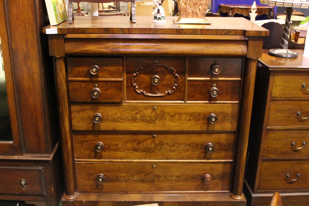 A LATE 19TH CENTURY TALL CHEST OF DRAWERS, with a long frieze drawer over 2 hat and 2 small drawers,